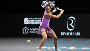 Zheng Qinwen powers into final on debut at WTA Finals