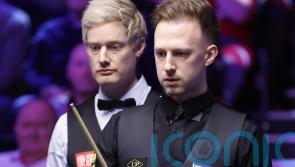 Judd Trump critical of table conditions after reaching last 16 in York