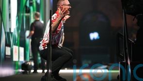 Damon Heta hits nine-dart finish but still exits World Championship