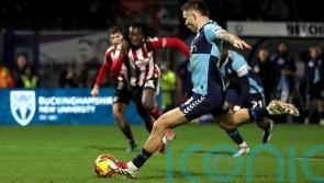 Late Aaron Morley penalty winner sends Wycombe top