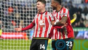 Sheffield United go top after coming from behind to beat 10-man Swansea