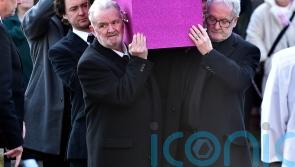 Linda Nolan funeral features pink sparkly coffin as sisters lead mourners