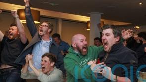 Joyous scenes at McIlroy&rsquo;s hometown club after members endure night of drama