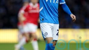 Stockport beat Huddersfield to clinch play-off spot