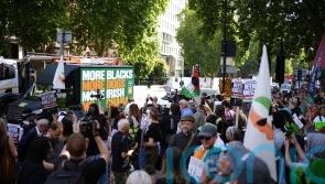 Kneecap &lsquo;plasters&rsquo; London with message of support for group member due in court