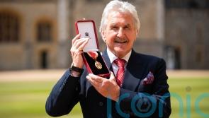 Gerald Davies calls for greater support for volunteers on receiving knighthood