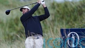 Scottie Scheffler takes grip of Open as Rory McIlroy charges up leaderboard
