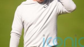 Rory McIlroy avoids cut trouble but off the pace at Wentworth