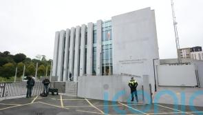 Man charged with murder of his parents and brother