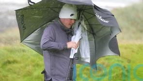 Robert MacIntyre battles brutal conditions to take share of lead on home soil