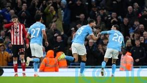 Man City close gap on leaders Arsenal with one-sided win over Sunderland