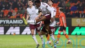 Hearts surge seven points clear after brushing aside nine-man Dundee United