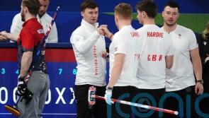 Britain&rsquo;s men face anxious wait to see if they will make Olympic curling semis