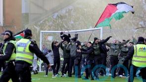 Fans clash on Ibrox pitch after Celtic knock Rangers out of cup on penalties