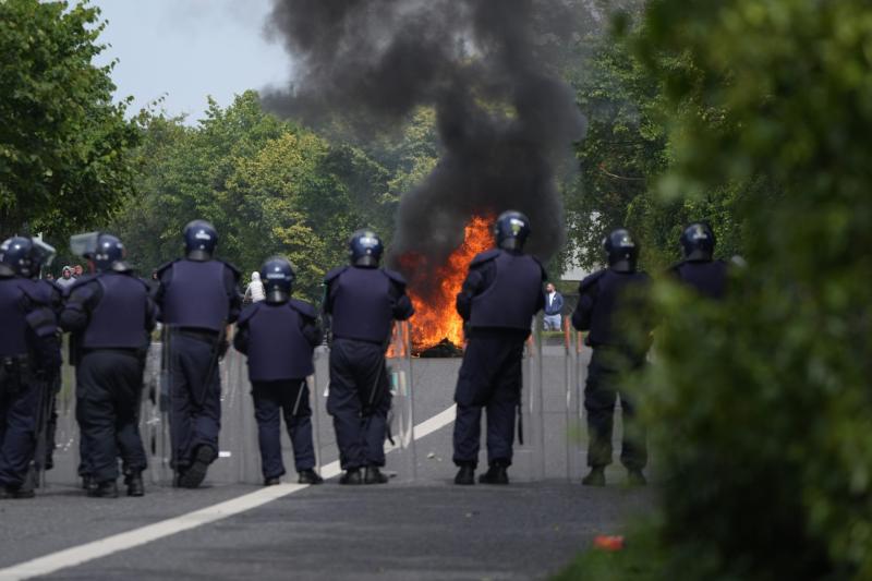 Gardai make arrests after coming under attack with missiles at site earmarked for asylum seekers