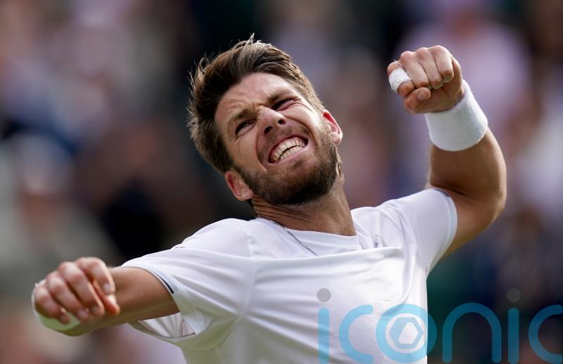 British number one Cameron Norrie battles back to beat Jaume Munar in five sets