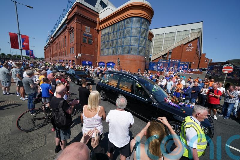 Rangers players and fans pay respects to Andy Goram at his funeral