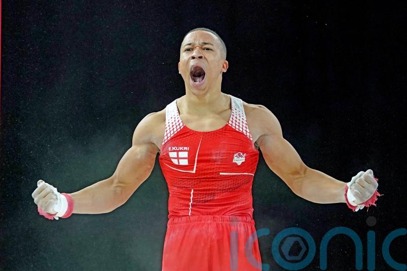 Joe Fraser battles through pain barrier to help England win team gymnastics gold