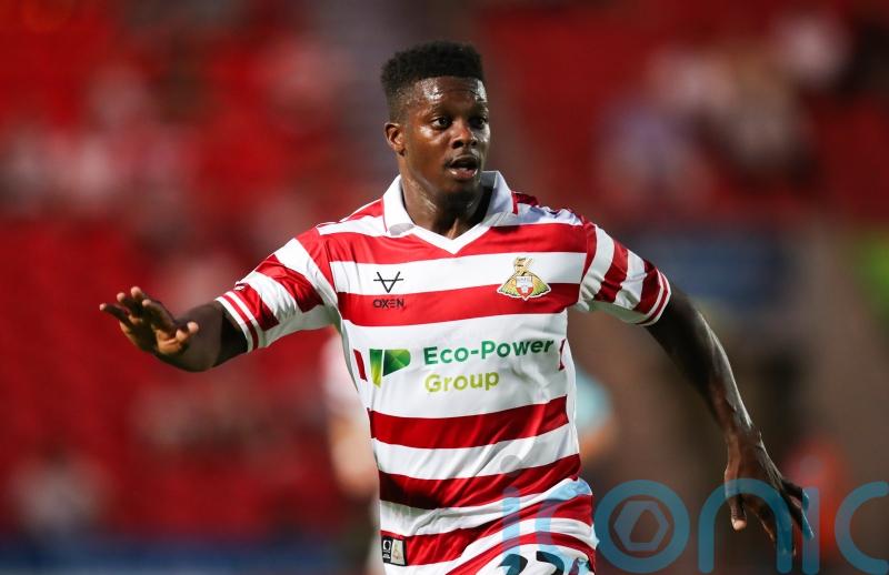 Kieran Agard&rsquo;s stoppage-time strike earns Doncaster victory over Stockport