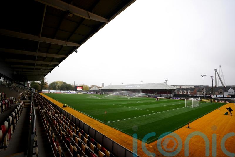 Neil Wood urges Salford to remain grounded after going top of League Two