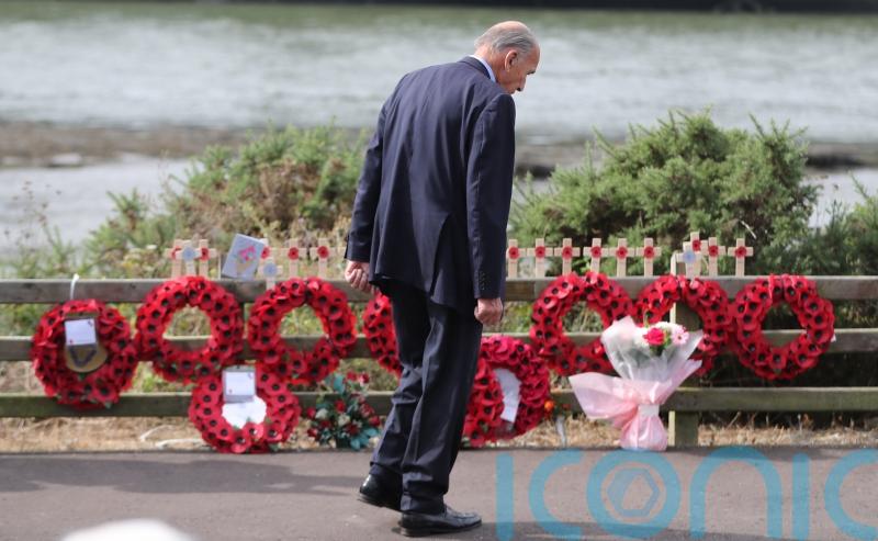 Desecration of wreaths and tributes at site of atrocity condemned