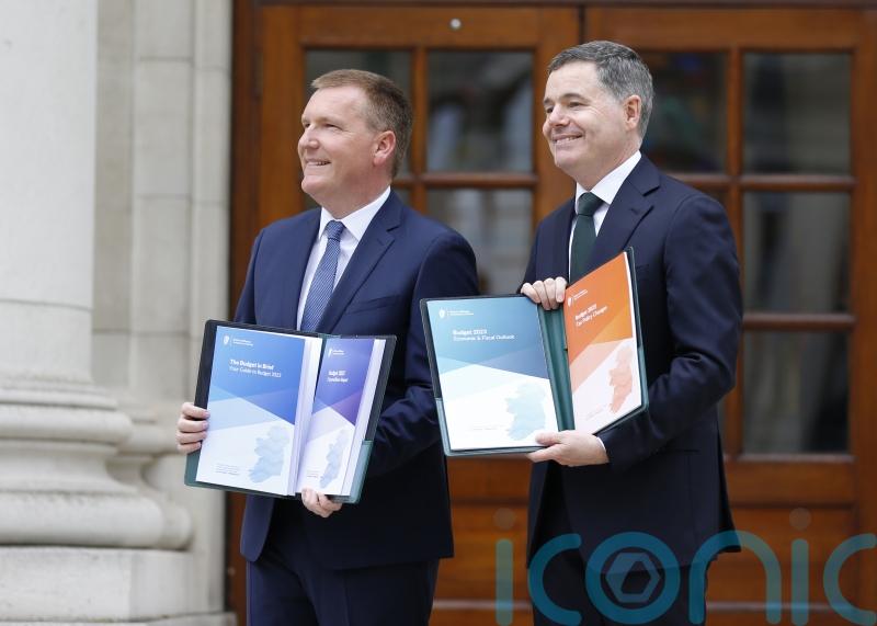 Scoffs at speeches and beaming ministers as Budget officially revealed