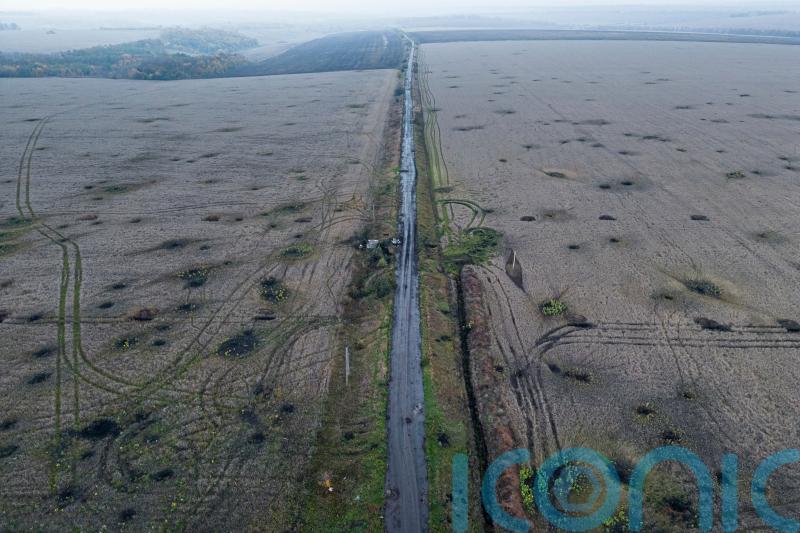 At least 20 killed as Russian forces bomb evacuation convoy in Ukraine