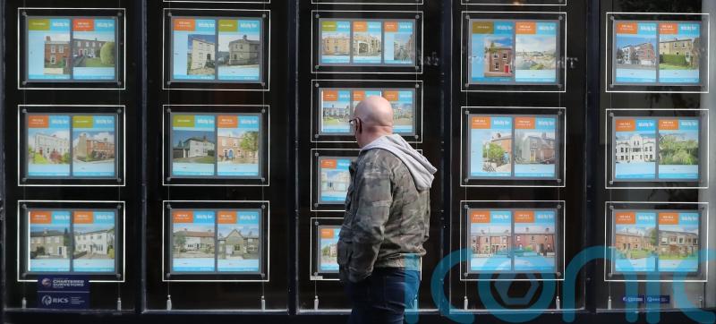 Rate of house price inflation halves as buyers become more cautious, poll finds