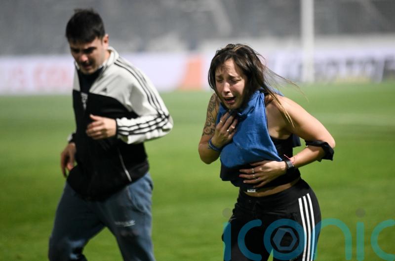 One dead after clashes between fans and police at football match in Argentina