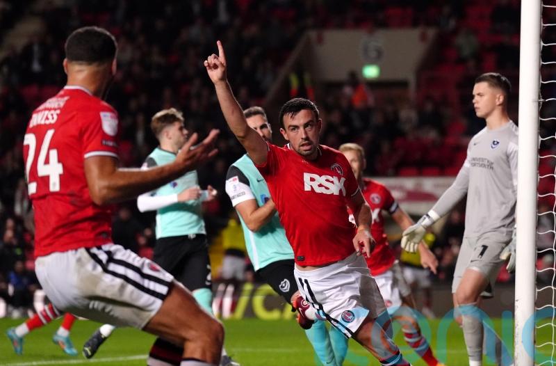 Ten-man Portsmouth endure night to forget as Charlton secure comfortable win