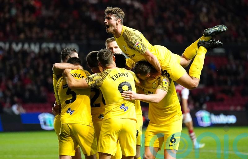 Greg Cunningham heads Preston to win at Huddersfield