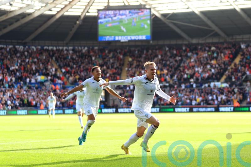 Swansea continue derby dominance with victory over 10-man Cardiff