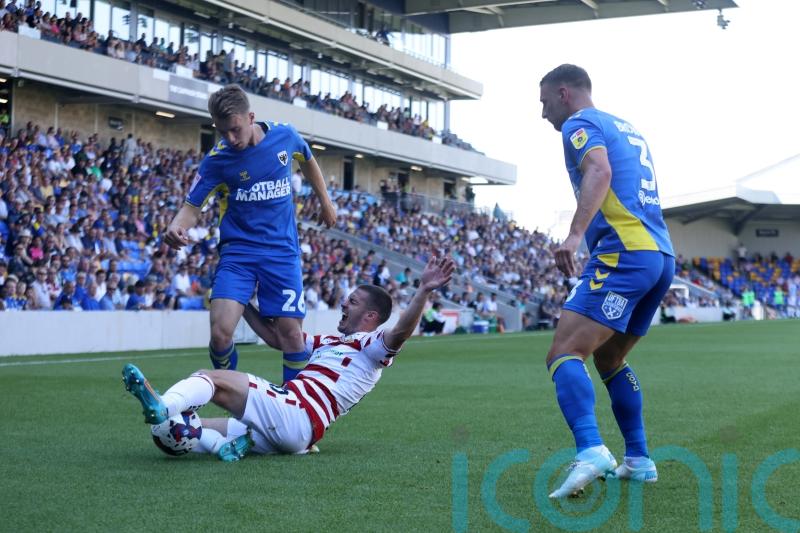 Jack Currie back into contention for AFC Wimbledon against Chesterfield