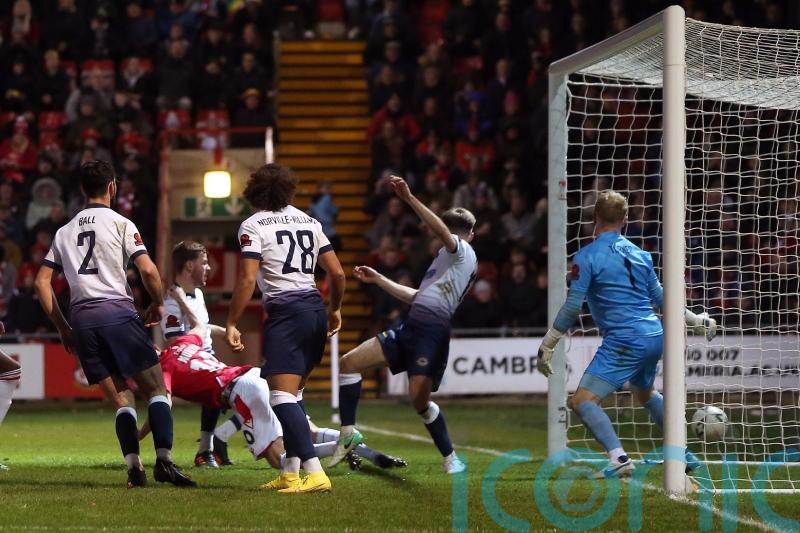 Paul Mullin hat-trick fires Wrexham into round three