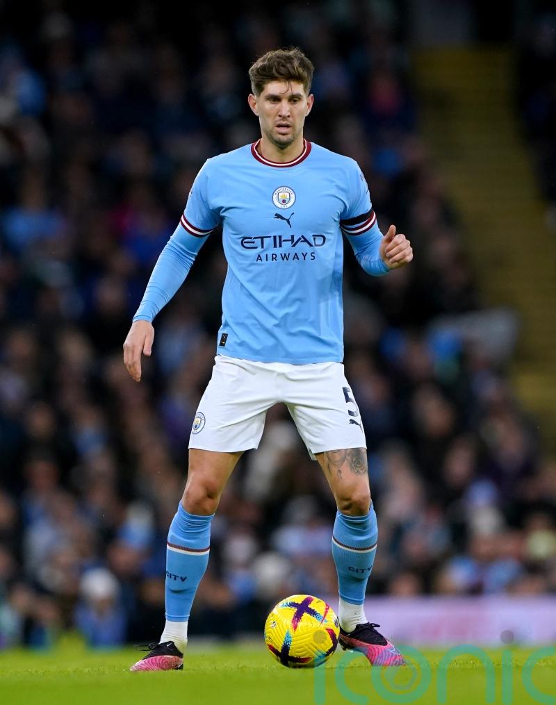John Stones fires title warning to Arsenal after Man City cut gap to five points