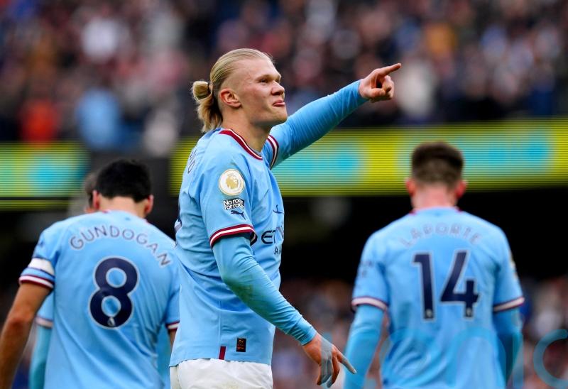 Erling Haaland treble helps Manchester City keep pressure on Arsenal