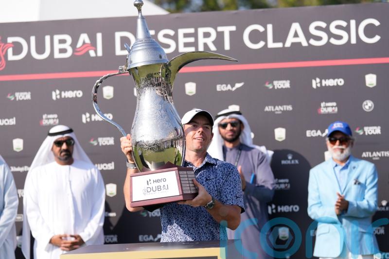 Rory McIlroy holds off rival Patrick Reed with birdie on 18 to seal Dubai win