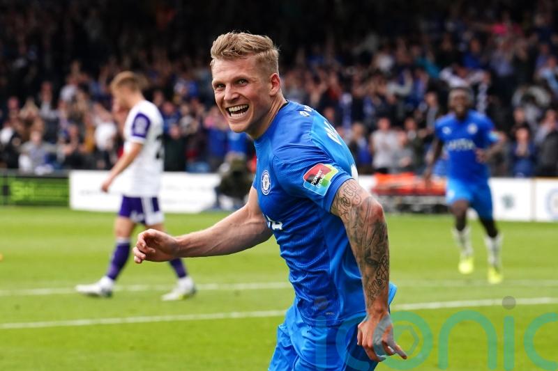 Stockport boost promotion hopes with Harrogate victory