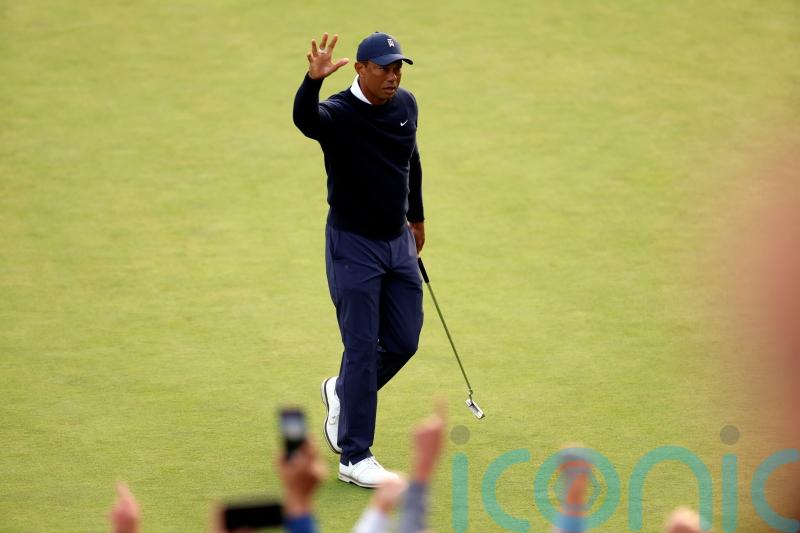 Tiger Woods finishes first round back with three straight birdies in California
