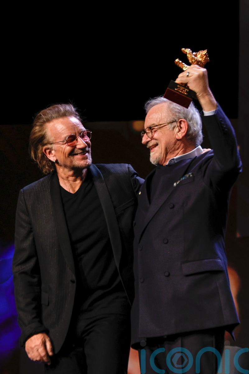 Bono presents Steven Spielberg with lifetime award at Berlin film festival