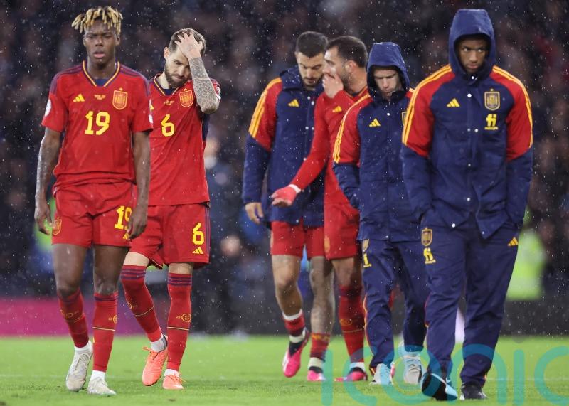 Eat humble pie and say the better team won, Alex McLeish tells Spain