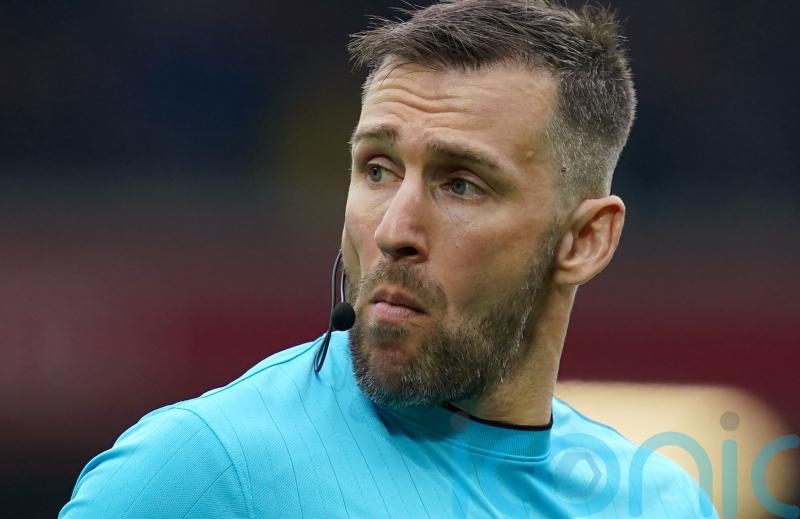 Assistant Constantine Hatzidakis returns to duty after Andy Robertson clash