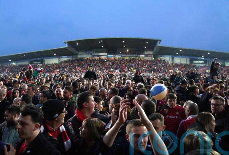 This is bonkers &ndash; Ben Foster clings to GoPro after Wrexham pitch invasion