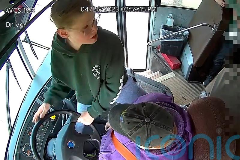 &lsquo;Little hero&rsquo; steers school bus to safety after driver passes out