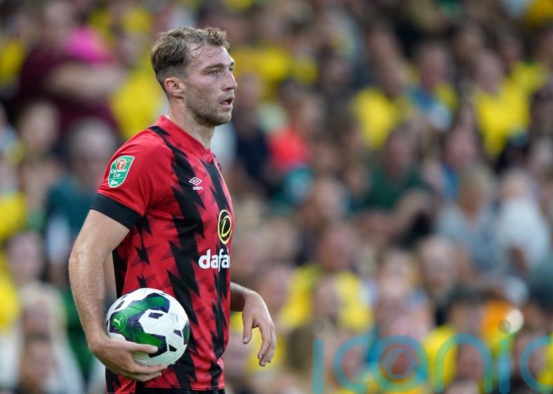 Norwich sign former Bournemouth defender Jack Stacey on three-year deal
