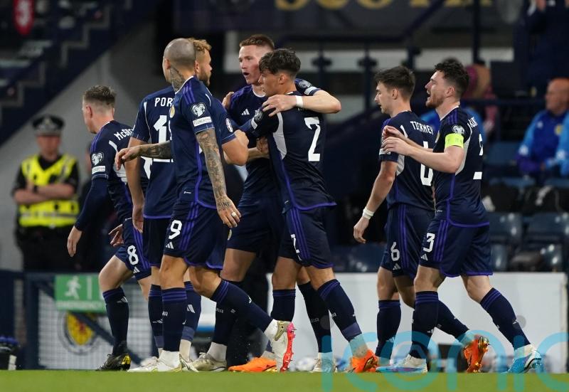 Scotland beat Georgia &ndash; and the weather &ndash; to move eight points clear in Group A