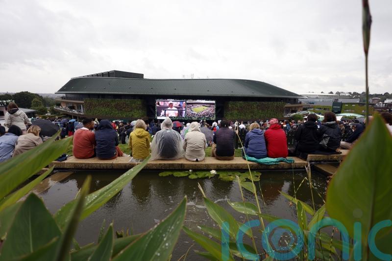 All play stopped on Wimbledon outside courts after consistent deluge on day two