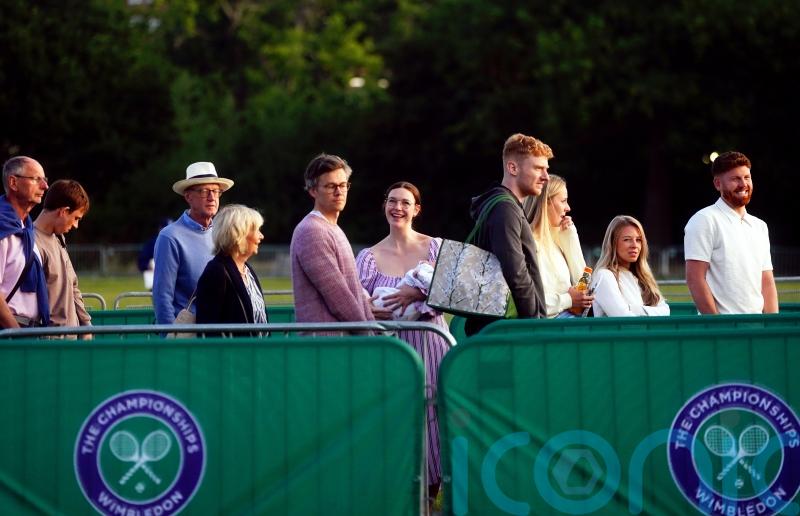 Wimbledon fans hoping for fewer showers after rain-hit second day