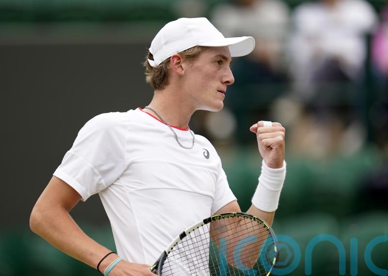 Henry Searle stays on course in bid to emulate Stanley Matthews at Wimbledon