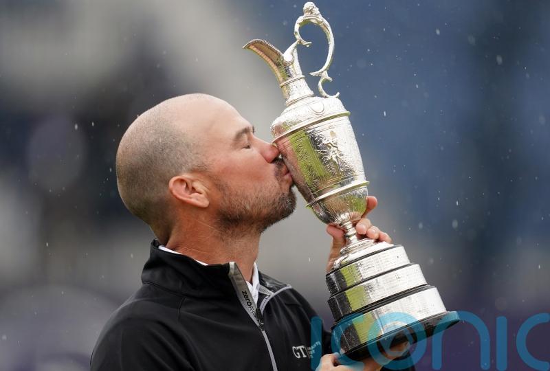 Brian Harman holds nerve to win Open Championship by six shots at rainy Hoylake